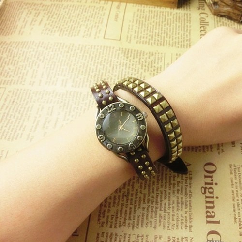 

Cowhide Korean version of the retro rivet watch gift girl Roman digital watch yellow